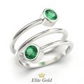 кольцо Karissa в виде спирали в белом золоте с зелеными камнями
