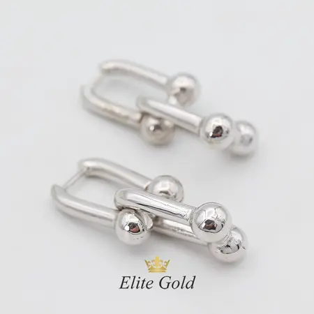 Designer Hardwear earrings in the style of a famous brand