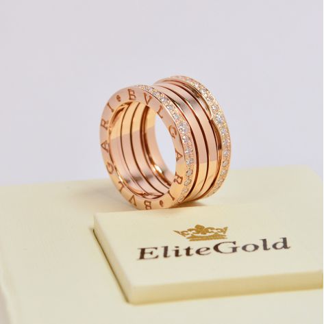 кольцо булгари с камнями по краю 4 спирали красный цвет