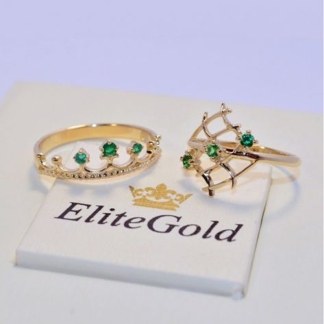 два женских кольца с зелеными камнями корона