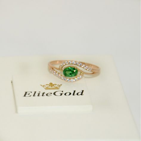 женское дизайнерское кольцо с овальным камнем зеленого цвета