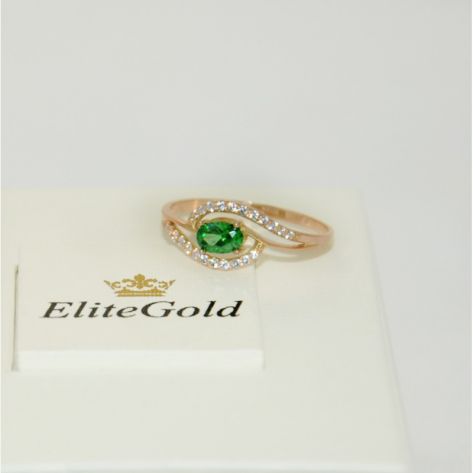 женское дизайнерское кольцо с овальным камнем зеленого цвета