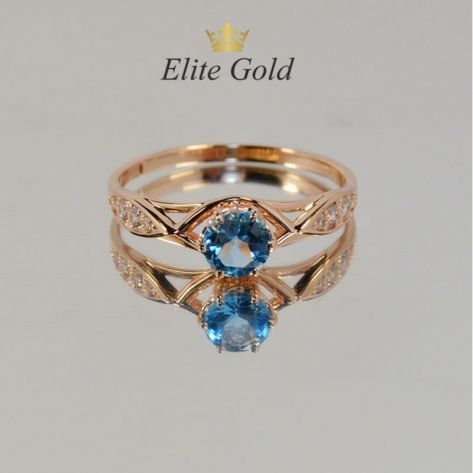 женское кольцо с камнями с топазом в красном золоте