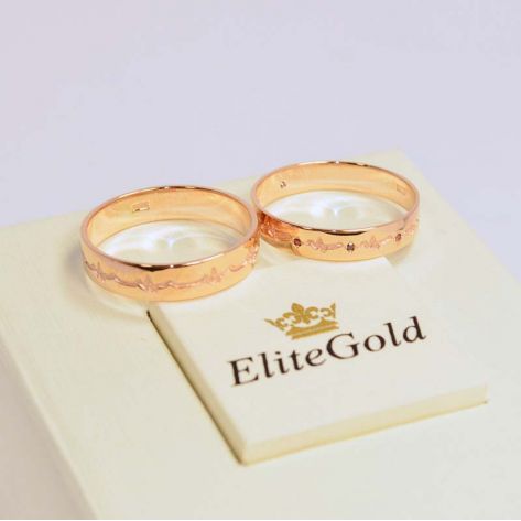 кольца Пульс в красном золоте с гранатами