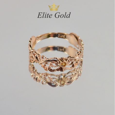 женское ажурное кольцо с узорами в красном золоте с цитрином