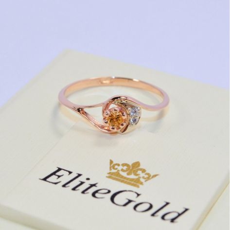 женское кольцо с камнями с цитрином в красном золоте