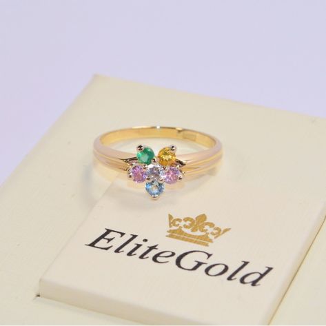 женское кольцо в форме цветка с разноцветными камнями