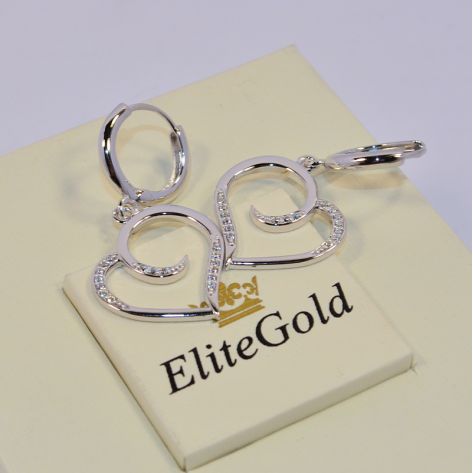 женские серьги в форме сердца в белом золоте и белыми камнями