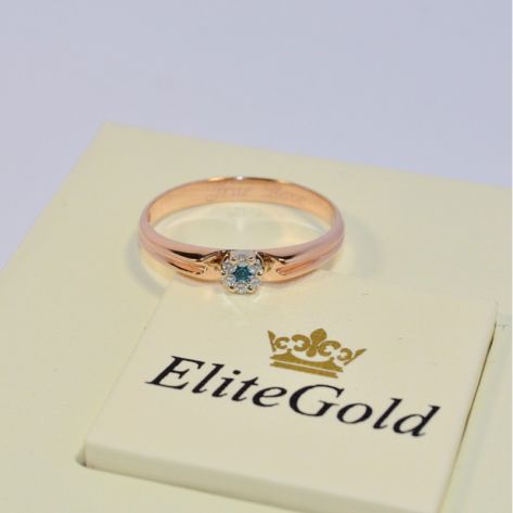 женское помолвочное кольцо в красном золоте с топазом и бриллиантами