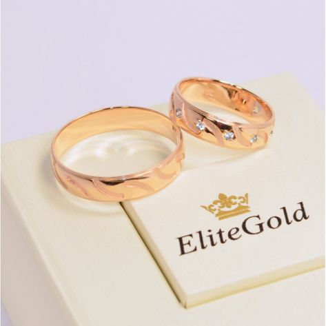 обручальные кольца с прорезями в красном золоте с топазами