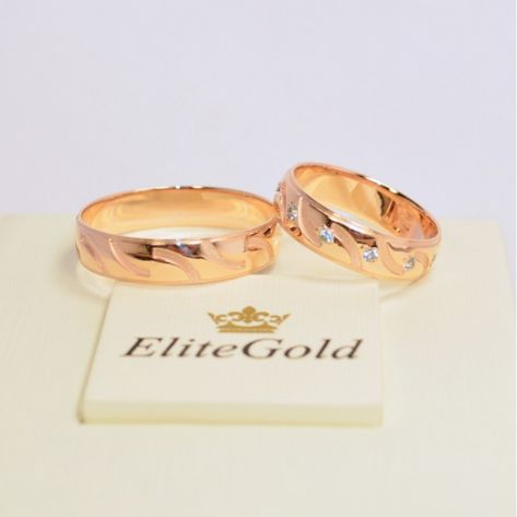 обручальные кольца с прорезями в красном золоте с топазами