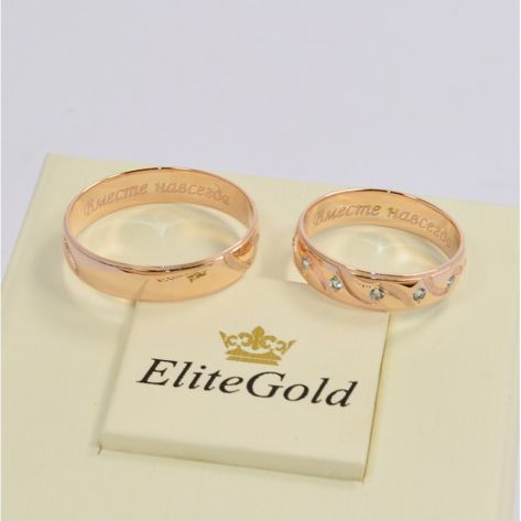 обручальные кольца с прорезями в красном золоте с топазами