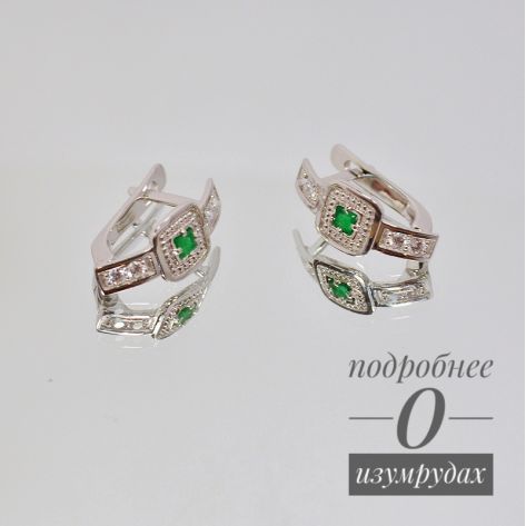 женские серьги с камнями в белом золоте с изумрудами