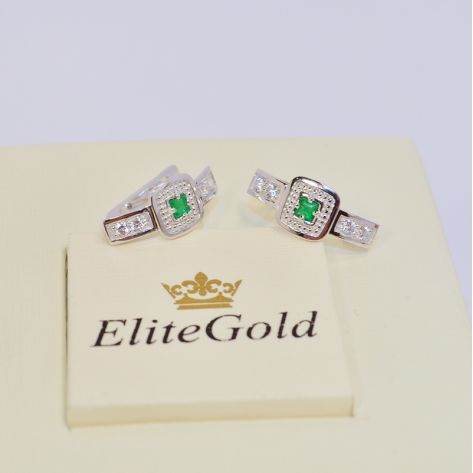 женские серьги с камнями в белом золоте с изумрудами
