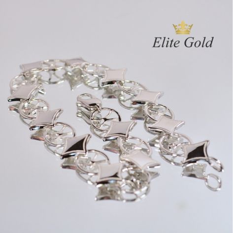 женский гибкий браслет с ромбами в белом золоте