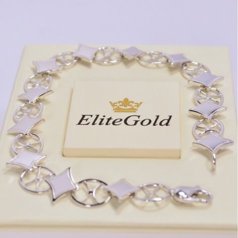 женский гибкий браслет с ромбами в белом золоте