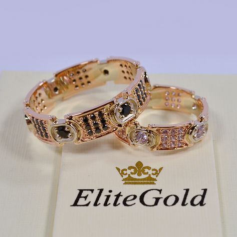 обручальные кольца в красном и белом золоте с черными и белыми фианитами