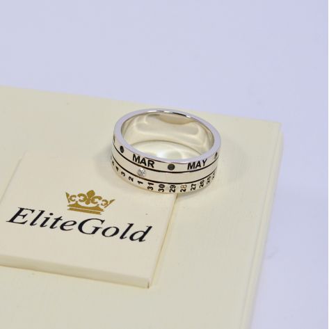 кольцо календарь в белом золоте и с бриллиантом