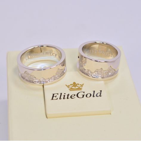 обручальные кольца с рисунком горы в белом золоте