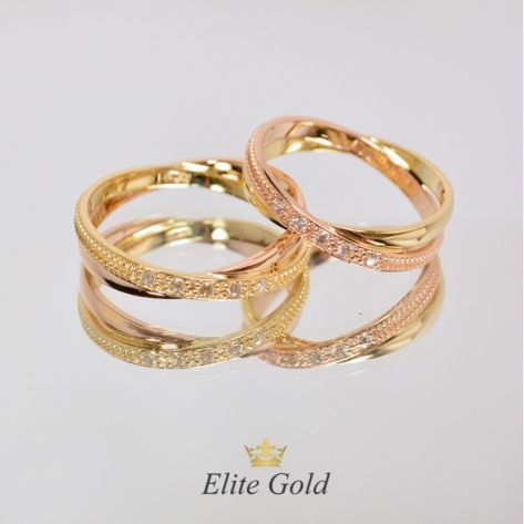 двойные обручальные кольца в красном и лимонном золоте с белыми камнями