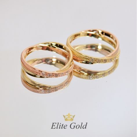 двойные обручальные кольца в красном и лимонном золоте с белыми камнями