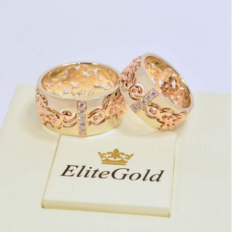 широкие ажурные кольца Joy of Love в красном и белом золоте