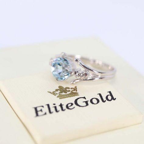 в белом золоте с топазом и бриллиантами