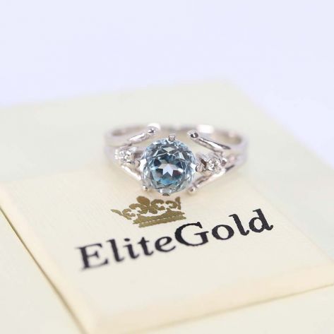 в белом золоте с топазом и бриллиантами