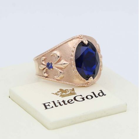 в красном золоте с синим фианитом и сапфирами