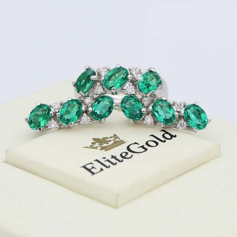 комплект Enola в белом золоте с гидротермальными изумрудами