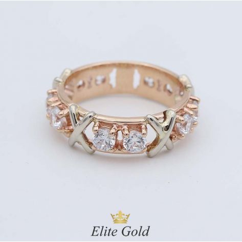 кольцо с перекрещенными линиями и камнями