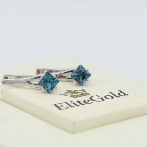 серьги классические в белом золоте с топазами