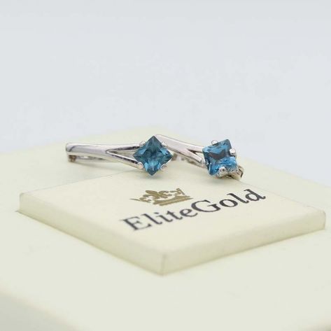 серьги классические в белом золоте с топазами