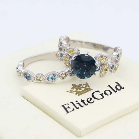 кольцо Viviana в белом золоте с желтыми сапфирами и топазами London Blue