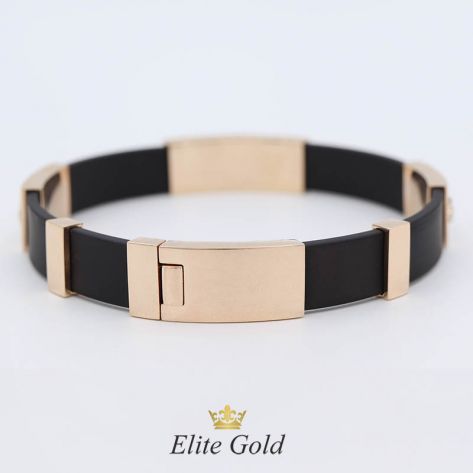 в красном и белом золоте с сапфиром и изумрудами