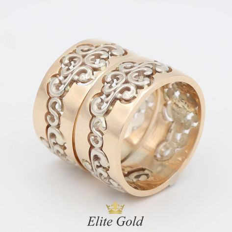 в красном и белом золоте с черными и белыми бриллиантами