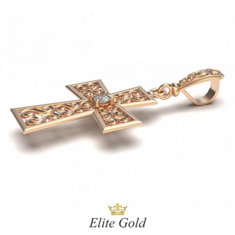 Золотой крест с узорами и камнем