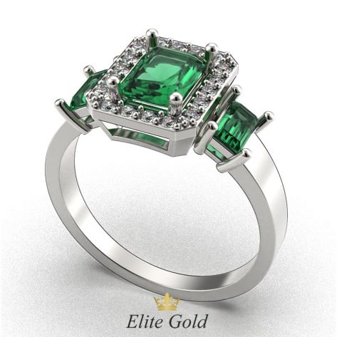 кольцо в белом золоте с изумрудами