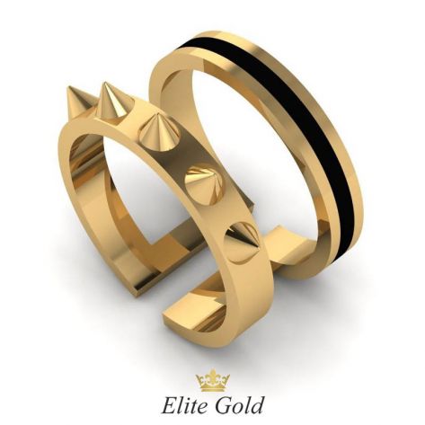 Золотое двойное кольцо с шипами