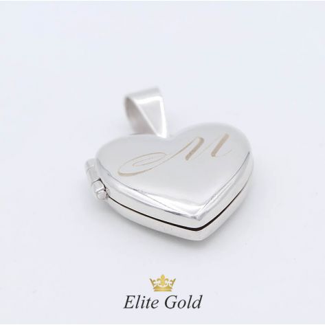 Золотой кулон в виде сердца вид изнутри