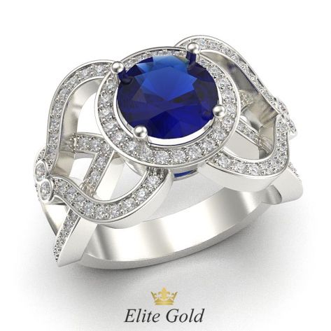 кольцо-многокаменка с крупным синим камнем в белом золоте