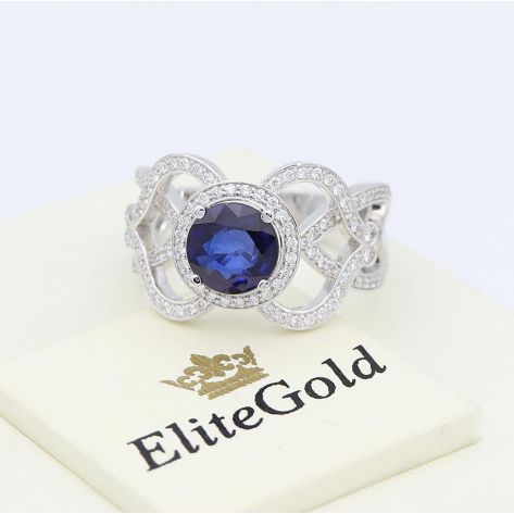 в белом золоте с сапфиром и бриллиантами