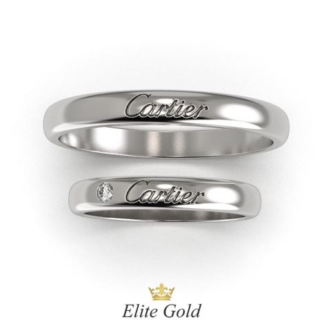 Классические обручальные кольца с надписью Картье в белом золоте