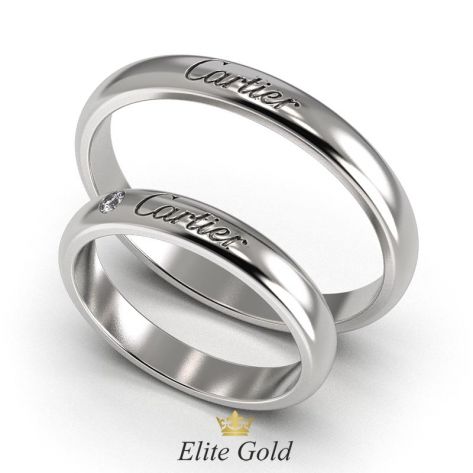 Классические обручальные кольца с надписью Картье в белом золоте
