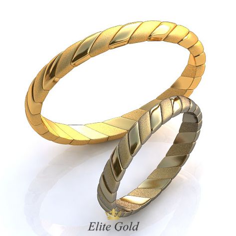Тонкие обручальные кольца Espara с рельефными элементами
