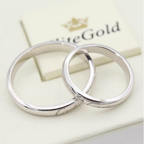 Классические обручальные кольца с надписью Картье в белом золоте