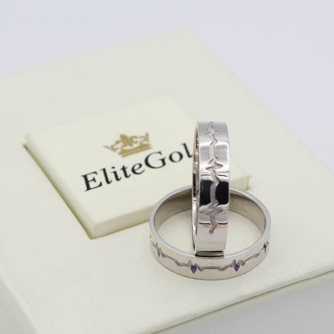 Обручальные кольца "Пульс" в белом золоте с аметистами