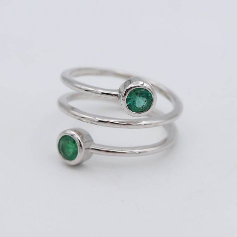 Авторское тонкое кольцо Karissa в виде спирали с двумя камнями