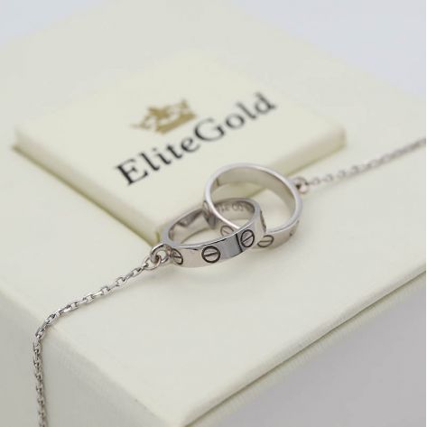 Браслет Love in White с переплетенными колечками по центру