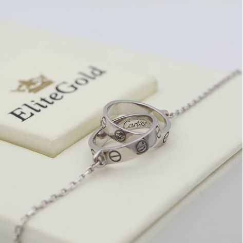 Браслет Love in White с переплетенными колечками по центру